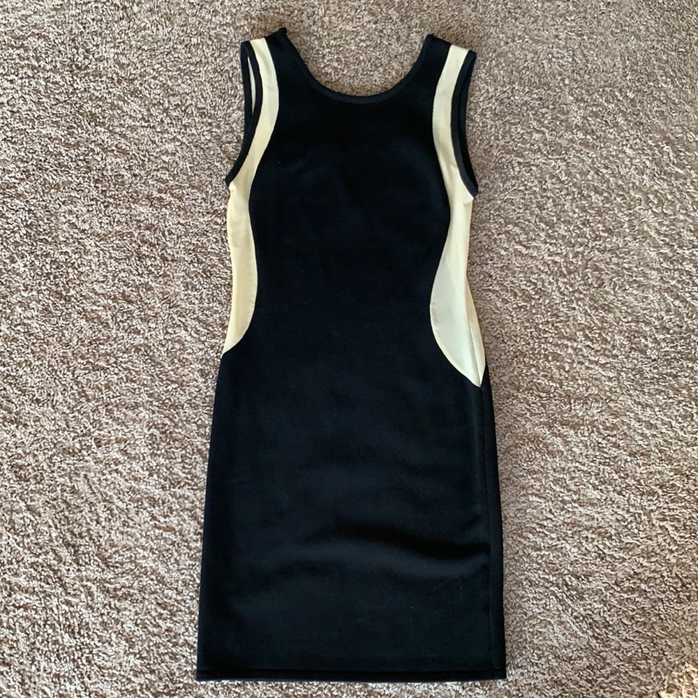 Black Akira mini dress with sheer side detail